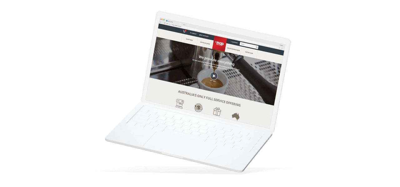 Computer showing screenshot from map coffee ecommerce site